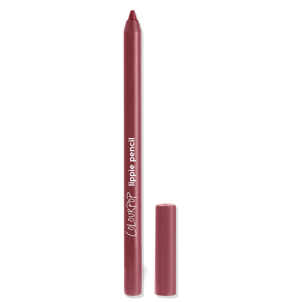 ColourPop Lippie Pencil Bounce stands upright with its cap off, revealing a sharpened rosy‑mauve tip; matte rose tube with white logo, cap set beside on a clean white background.