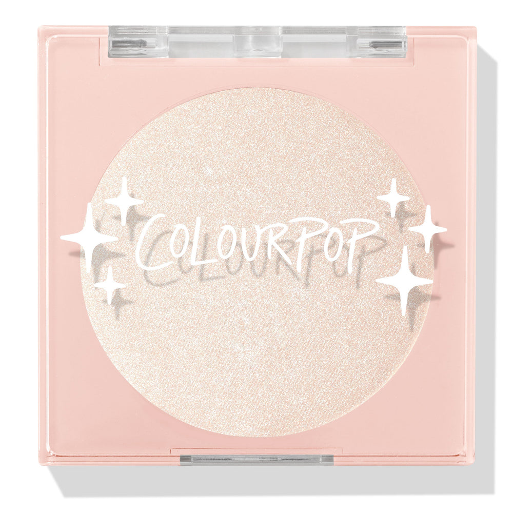 Cold One highlighter compact showcasing a shimmering icy pearl pan behind a clear lid with white sparkle icons and ColourPop logo, closed in a blush‑pink square case on a white background; ColourPop Pressed Powder Highlighter.