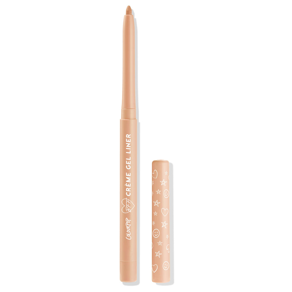 ColourPop Crème Gel Liner Honeydude shown uncapped, twist-up nude beige eyeliner with rounded tip standing upright on a white background, its peach cap set beside it with white heart, star, and smiley doodles.